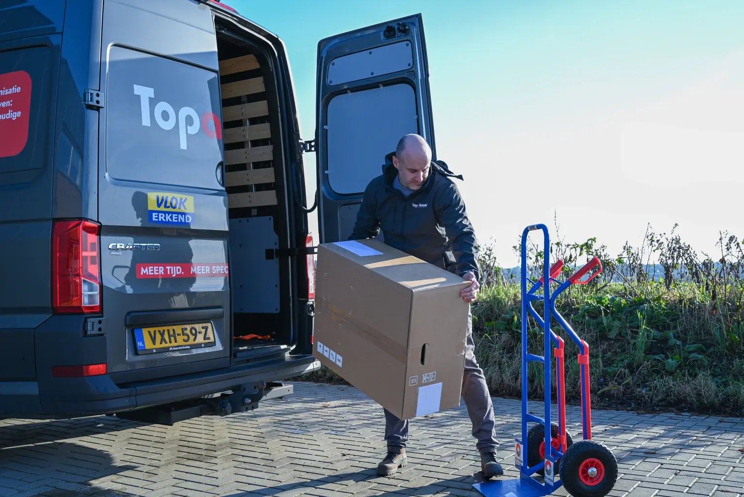 TopaTeam klusbus met VLOK logo